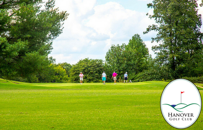 Golfers on course greens